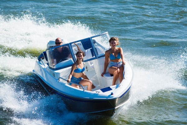 About Our Agency - Girls Ride on the Boat to Drift on a Beautiful Day